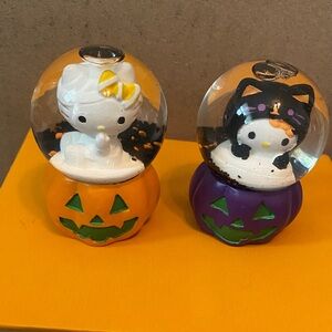 Sanrio Hello Kitty Orange and Purple Pumpkin Snow Globe Pair